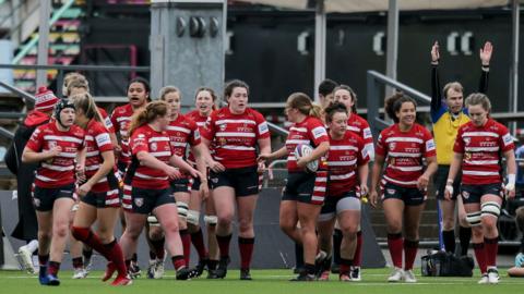 Gloucester-Hartpury team celebrate a try