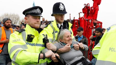 Woman being arrested