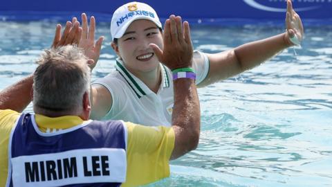 Mirim Lee and her caddie after winning the 2020 ANA Inspiration in September