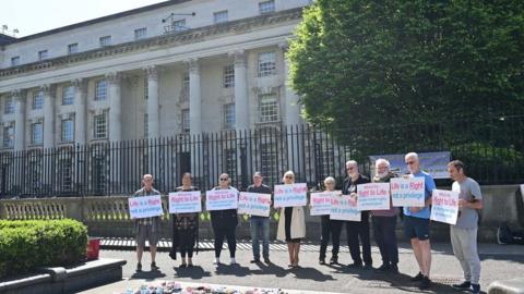 Anti-abortion campaigners protested outside Belfast High Court on Thursday