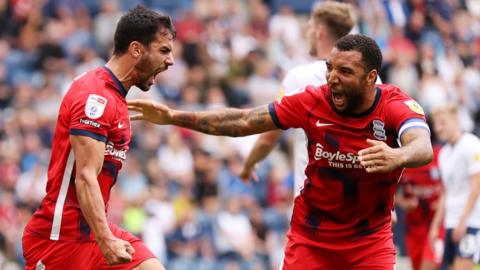 Maxim Colin (left) celebrates with Birmingham City team-mate Troy Deeney