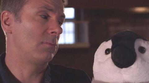 Spencer Kelly and a penguin