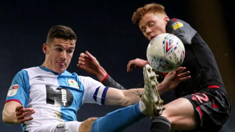 Blackburn's Darragh Lenihan (left) tussles with Sam Clucas of Stoke