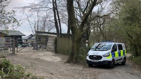 a police van outside the property