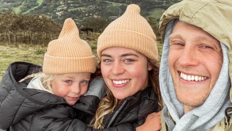 Meg Ward, her partner Josh and daughter Marlowe