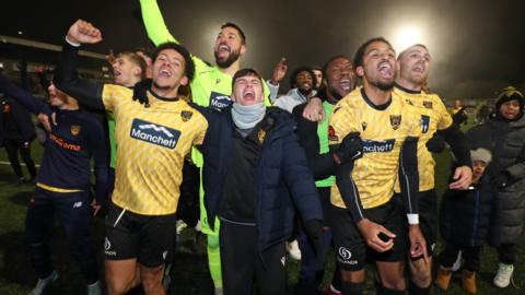 Maidstone celebrate their FA Cup win over Barrow