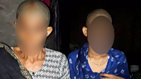 The two women had their heads forcibly shaved