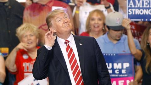 President Donald Trump gestures during a rally at the Phoenix Convention Center on August 22, 2017 in Phoenix, Arizona