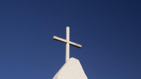 Picture of a cross on the roof of a church in Chile