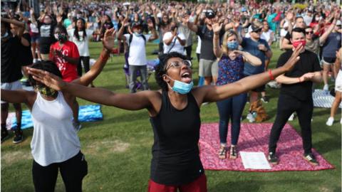 A large group holds a Juneteenth prayer in Atlanta on Friday