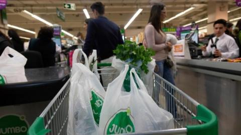 View of plastic bags inside a trolley at a supermarket in Santiago, on July 18, 2018.
