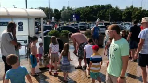 Delayed Eurotunnel passengers try to stay cool