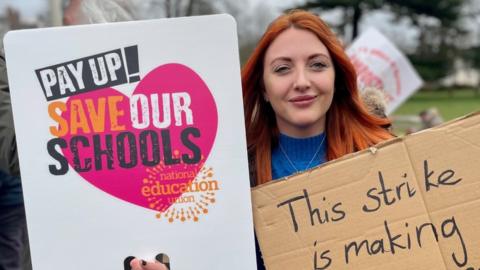 A teacher striking in Leamington Spa