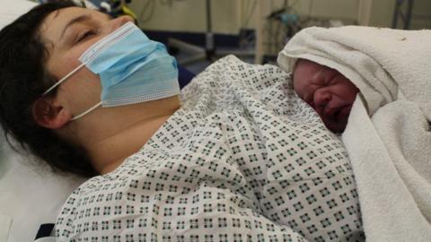 Rosie with her newborn son