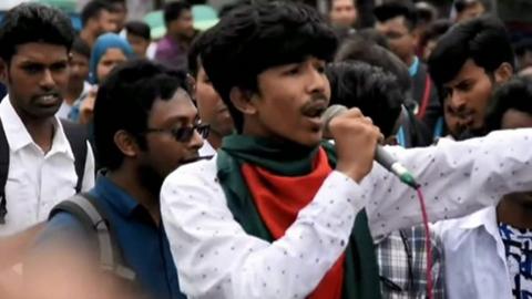 Protester speaking to crowds in Bangladesh