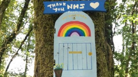 NHS sign on fairy door