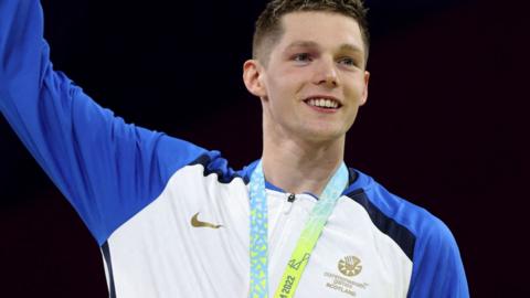 Duncan Scott celebrates winning men's 200m freestyle Commonwealth Games gold