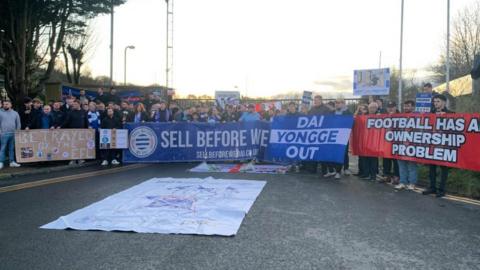 Protesters outside Wycombe Wanderers FC football ground