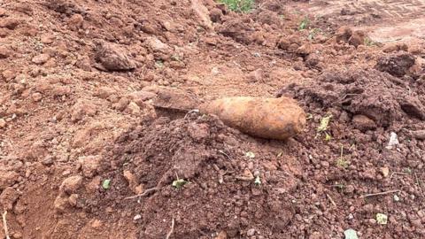 A bomb that has been dug up from the earth