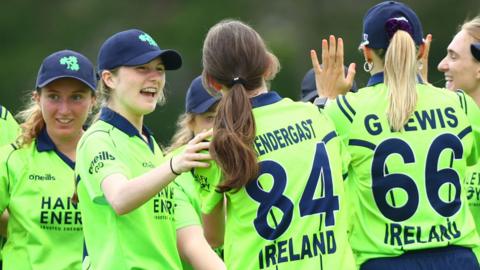 Ireland celebrate taking a wicket aganinst Scotland