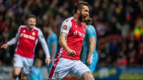 Ollie Palmer celebrates after scoring for Wrexham