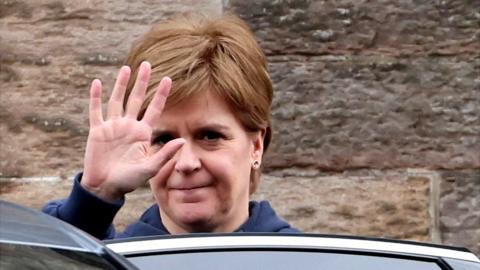 Nicola Sturgeon getting into a car from Bute House