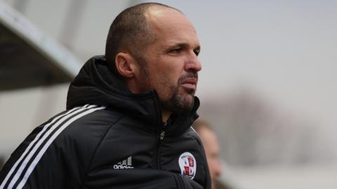 Matthew Etherington in the Crawley dugout