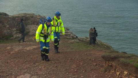 Coastguards searching