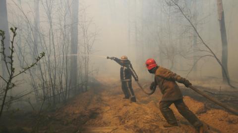 Firefighters in the Chernobyl exclusion zone 10 April