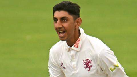 Somerset spinner Shoaib Bashir celebrates taking a wicket