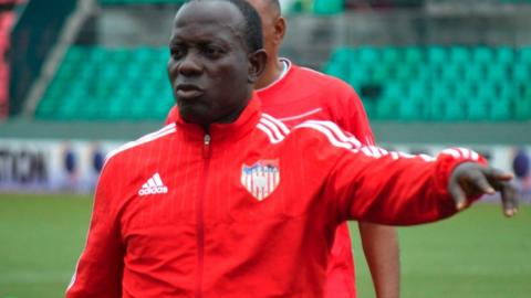 Thomas Kojo coaching the Lone Stars