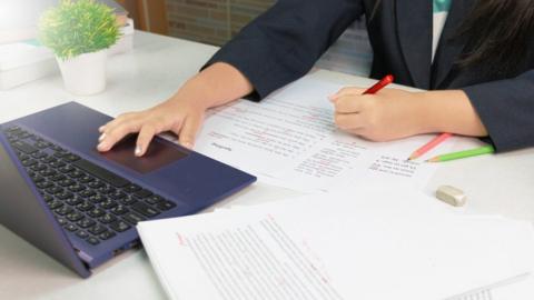 Proof reading a document - stock image