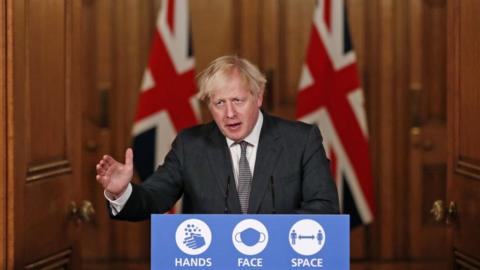 Prime Minister Boris Johnson speaking at a press conference in 10 Downing Street, London