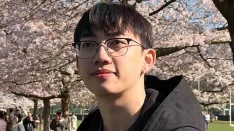 A young man in nature background