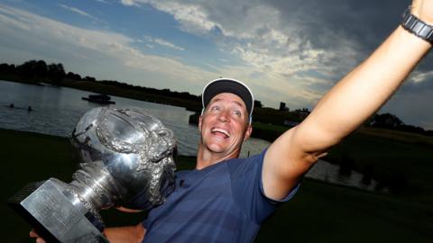 Alex Noren celebrates with French Open trophy