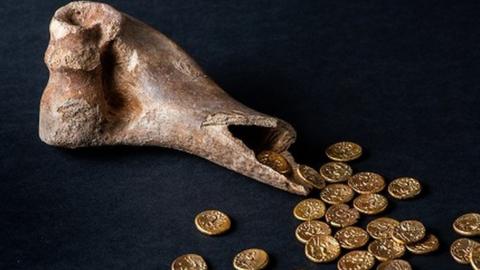 The Sedgeford Hoard, 32 gold Iron-Age coins found inside a cow bone at Sedgeford, Norfolk,