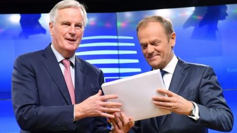 EU Brexit chief negotiator Michel Barnier (L) with European Council President Donald Tusk