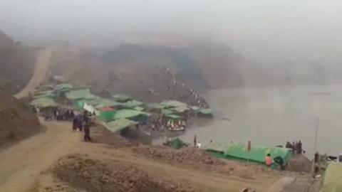 As many as 100 people are feared missing after a landslide at a jade mine in Myanmar.