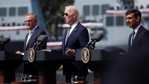 The three leaders' news conference