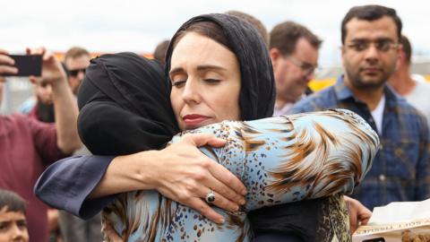 Jacinda Ardern hugs woman