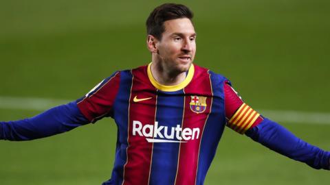Lionel Messi celebrates scoring for Barcelona against Getafe