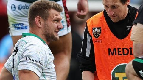 Dan Biggar receives treatment at Leicester