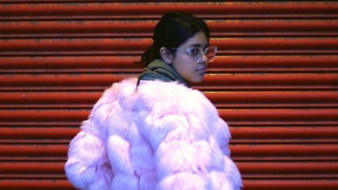 Woman in pink coat