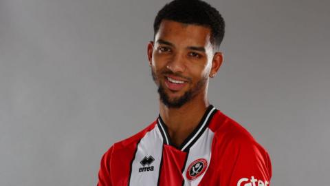 Mason Holgate in a Sheffield United shirt