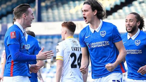 Rasmus Nicolaisen celebrates his goal for Portsmouth against King's Lynn