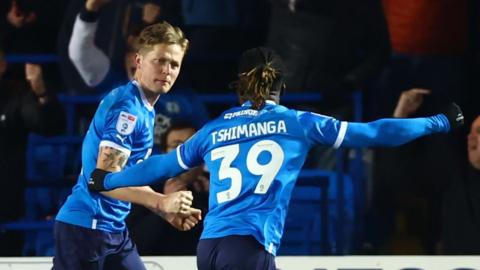 Frankie Kent celebrates his winner for Peterborough