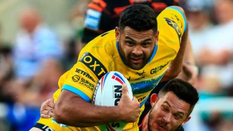 Rhyse Martin of Leeds Rhinos carries the ball