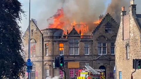 Six trucks and two height vehicles were sent to the B-listed building on Hunter Street.