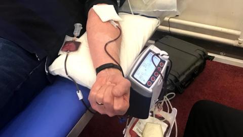 man giving blood