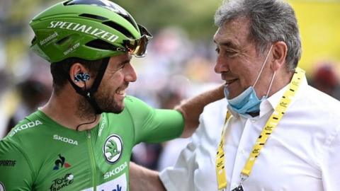 Mark Cavendish embraces Eddie Merckx at the 2021 Tour de France